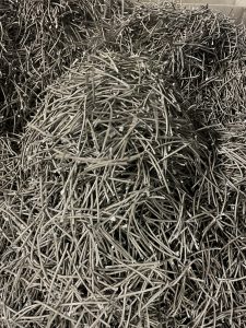 Lavorazione di rottami di cavi in alluminio e ferro per la reintroduzione nel ciclo produttivo